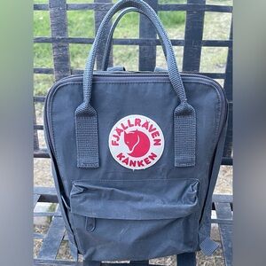 Fjallraven Kanken Mini Backpack in Black with Red Logo